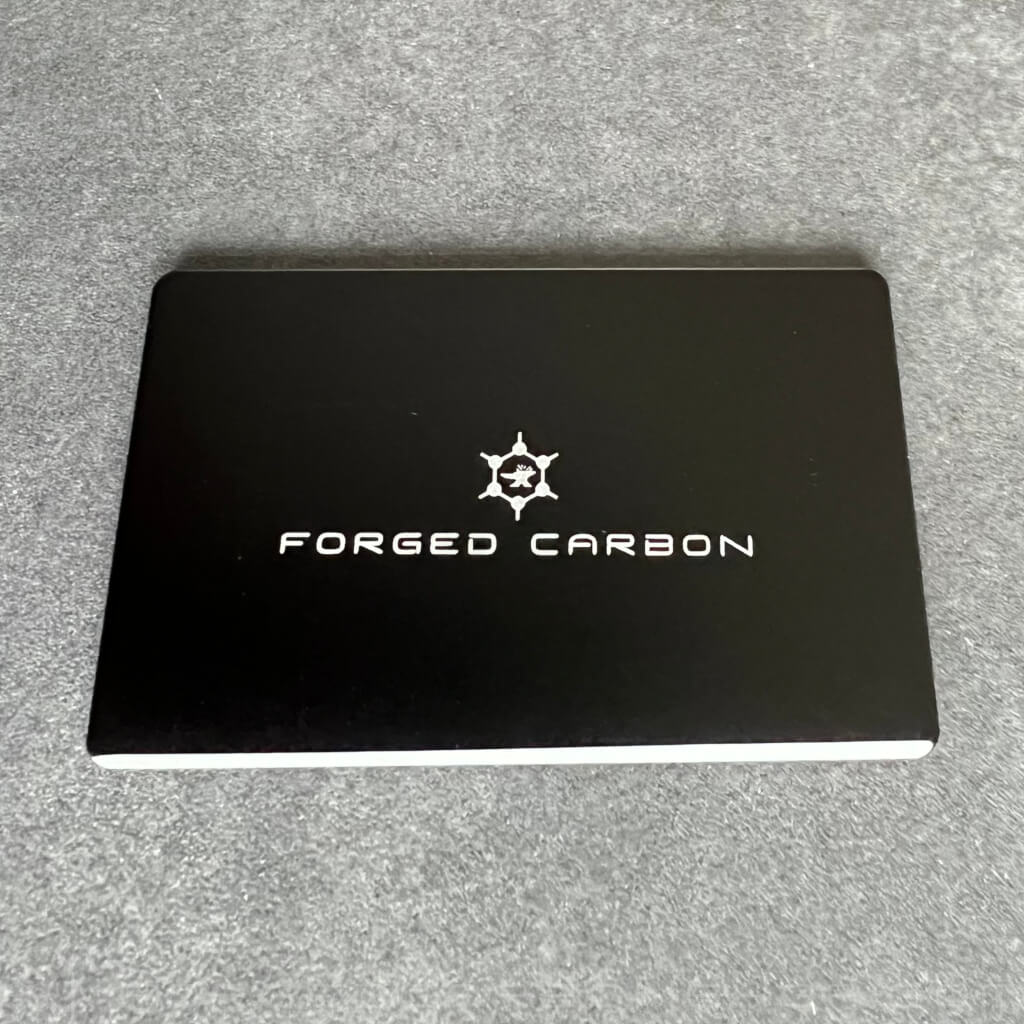 Forged Carbon Muenzfach Coin Case Logo